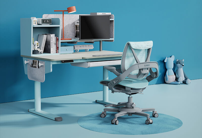 Hinomi Zee ergonomic children’s chair in a blue-themed desk setup with a monitor, books, and soft toys.